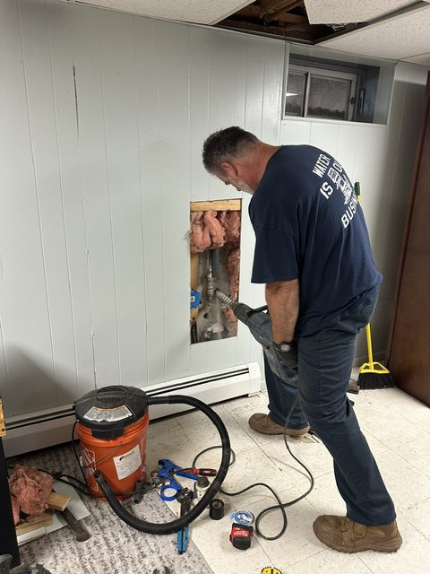 Greco & Haines technician repairing a residential well water system