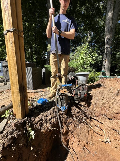 Greco & Haines technician completing residential well service